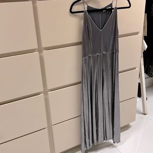 It’s a beautiful silver dress by Halston, It was worn just twice!